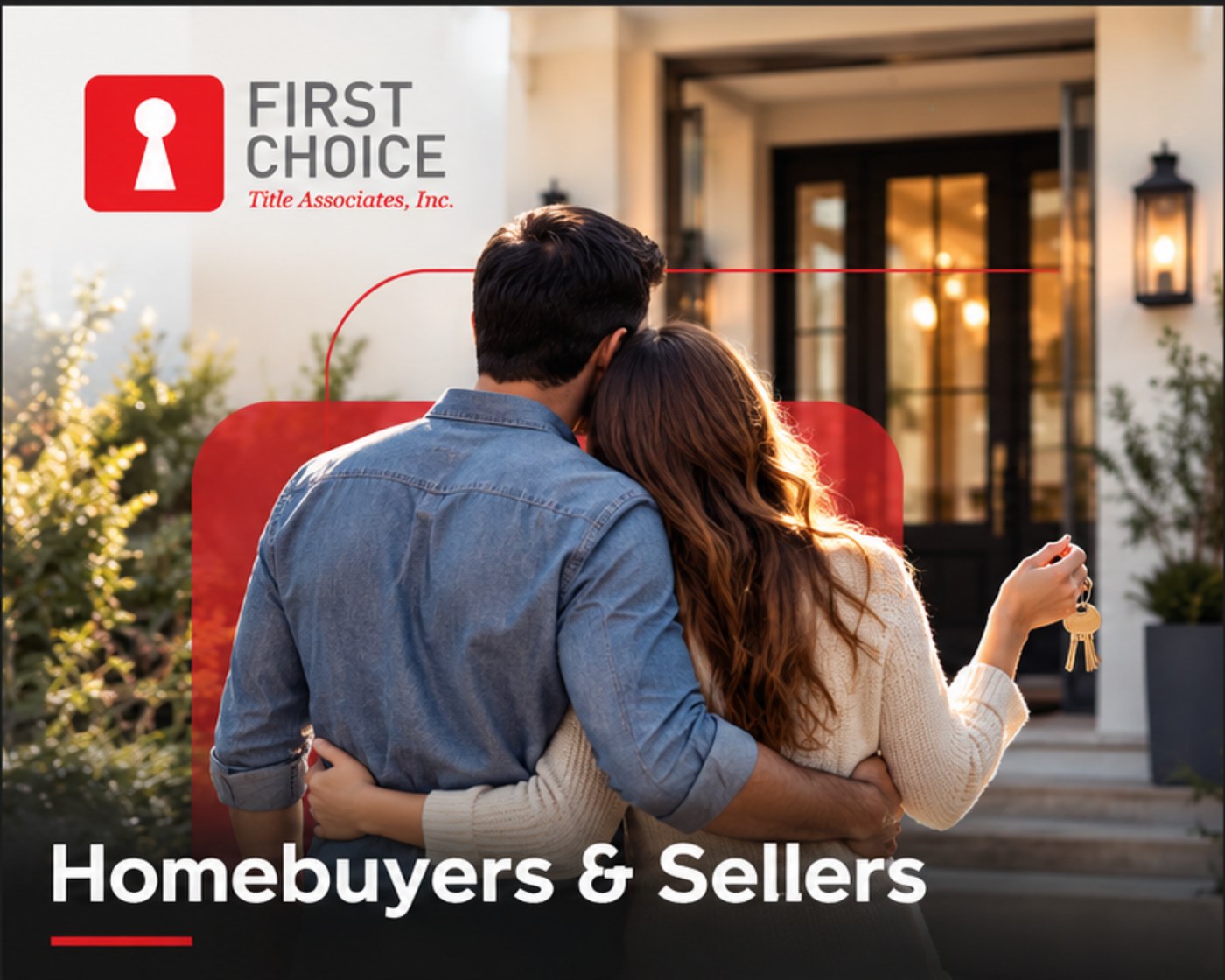 A couple holding the keys to their new home outside the front door.